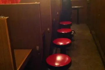 Individual stalls--kind of like a prison viewing room? (Photo: Miyuki Miyama)