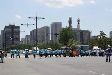The parade heads towards Tokyo Station