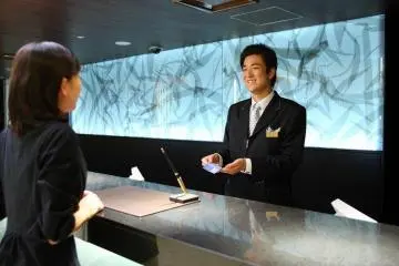 Hospitality starts with care at the front desk (Photo: Crowne Plaza Osaka)
