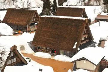 It had been warm till the day before I visited, and I found that the snow on the roofs had slipped off, and snow on the roads melted away