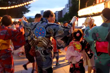 Three generation take part on Hokkai Bon Odori for children. (Photo: Endarastya Sarah)