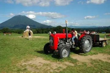 Playing in the fields behind Milk Kobo (Photo: Cliff Bernstein)