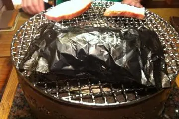 Meat and a potato grilling nicely (Photo: Nuala Connolly)