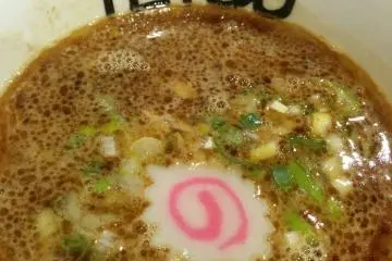Tsukemen broth topped with pink and white naruto (a kind of fish cake) (Photo: Odilia Djoenar)