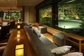 Common area on the ground floor for guests to rest and snack while looking out over the garden. (Photo: Premier Hotel Group)