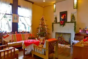 The inside of the house is done up with brilliant Christmas ornaments