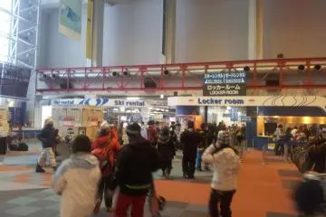 Roll off the bullet train into the cavernous base building right next to the ticket counters, locker rooms and rental department. Once your are set it is up the gondola to the snow.