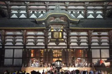 The buddha statue can be seen through the square opening in this photograph: the night-time view is so calm and very different from the the daytime view (Photo: Manish)