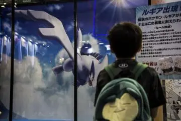 A child admiring his favorite Pokemon (Photo: Ignatius Koh / JT)