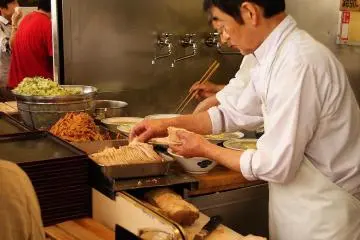 This ramen stand is in constant motion
