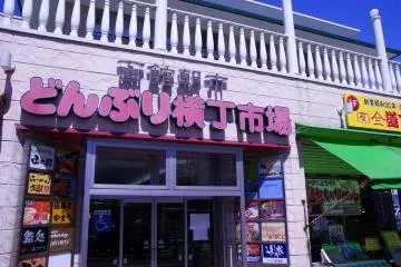 The doors that lead to restaurants beside Ekini Market