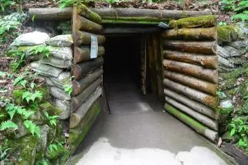 Gate to the dark and slippery old tunnel where people dug out amber from its source in times past. Watch out!