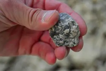 A stone impurity found in the clay raw material.