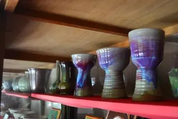 Modern and old pottery on display inside the main building.