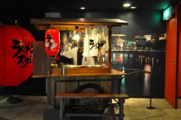Photo op: a yatai on display at the entrance of the “stadium.’ Fukuoka is famous for these informal food stalls that are set up every night on the streets and serve food such as ramen. (Photo: Michelle Madden)