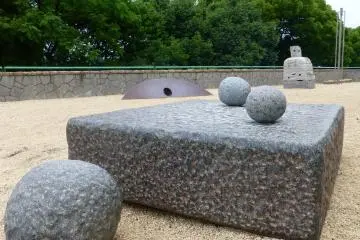 Makio Yamaguchi's 1988 sculpture invites visitors to move the smaller stones around and listen to the sound which follows