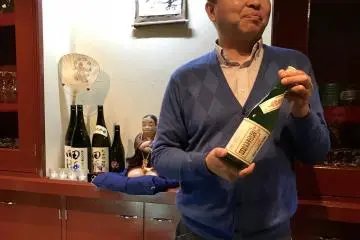 The bar owner, Kaoru Sasaki, is passionate and knowledgable about sake (Photo: Kim B)