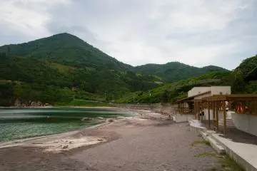 The changing rooms and toilets complete the beach.