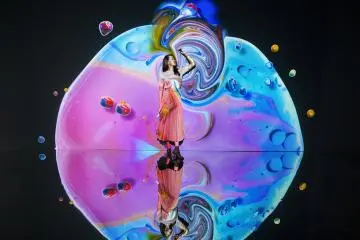 Pose with the "Fluid Wall" (Photo: Naked)