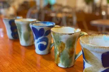 Local pottery is used to serve beverages in (Photo: Bloom Coffee - used with permission)