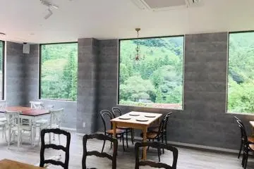 The cafe's large windows open up to the stunning nature outside (Photo: Mitake Terrace - Used with Permission)