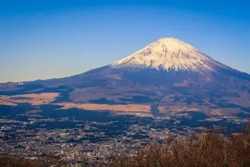 Mount Fuji (Photo:  Blue Mountain – <a href="https://www.flickr.com/photos/reggiepen/23538698586/in/photolist-BS2Z1N-rDLKgW-3XVfKb-2hUDMdV-9dCsJe-uasTQx-J3QRMb-rXD9AA-rqnok5-ACJgY-rXGeHc-2hUA915-9dCsJT-rpuKFo-49geYo-49gg6d-rFXWRv-A3RMMs-5ri1km-rqmbaJ-49ccUM-4aB83r-49gfks-2rZfRX-mxsMUF-bGRUQc-J29p85-RRr6WY-QQv865-roBahT-7UC9aF-rpuSLf-pb7By5-UN3JMi-2FBrKJ-d2zy6j-rhFaPo-QQv73y-W3hpmV-5k2817-Gn5gkB-zoqgSG-pdkCsR-5rhZJ1-PQ35aD-pcEfoj-PgqfrS-ACJk2-opgBsD-SnZMqo" target="_blank" rel="noreferrer noopener nofollow">Reginald Pentinio</a> / <a href="https://creativecommons.org/licenses/by/2.0/" target="_blank" rel="noreferrer noopener nofollow">CC BY 2.0</a>)