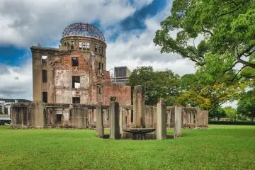 Photo:  Atomic Bomb Dome – <a href="https://www.flickr.com/photos/harquail/49315604552/in/photolist-2i8Rn71-8HMaaN-ovudRu-6ivX7f-y9QGFE-5DLvhy-9HpCt9-XzQZnf-9HmK6B-x6X7a-cj2tw9-23VPsaW-qFFVcJ-MWEKDX-6aKmDt-eexyjD-cj2cjA-jo9HW-b9B6Fp-YVEEh9-e7h7t-2eMTZiE-2iVBBXW-2j6yQcC-2i83ipW-77Z72X-Yqiwqf-qninHe-pdiTwk-KvwRpS-btb8m2-2gZVUWM-dDXojx-qZbRa4-8E5x23-9PVcJW-9PSjYi-9PVcEq-Yqiy6Q-S3H3jR-5nnsKq-yHRrhA-rKufbC-ttwQbG-RRMcav-UgxJkC-jq6c9-2dpbCpY-GuMj7X-2cQQyKf" target="_blank" rel="noreferrer noopener nofollow">Shawn Harquail</a> / <a href="https://creativecommons.org/licenses/by-nc/2.0/" target="_blank" rel="noreferrer noopener nofollow">CC BY-NC 2.0</a>
