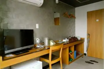 The long desk and genkan.