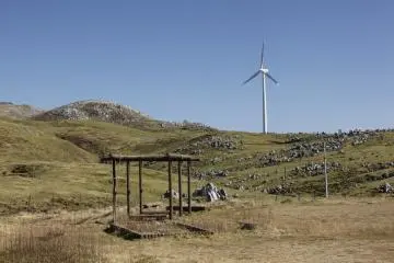 One of several wind turbines (Photo: <a href="https://picasaweb.google.com/head.philip/TenguHighlands" target="_blank" rel="noreferrer noopener nofollow">Philip Head</a>)