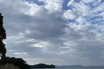 Twice a day the islands connect (Photo:  At low tide the road disappears. – Photo courtesy of Rie Toda)