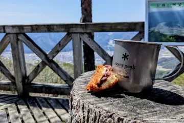 Eating Tempura Manju at Mt. Anbou Observation Deck