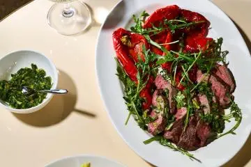 Seared rump steak, roasted red peppers and wild rocket, salsa verde (Photo: Kristin Perers via Bills)