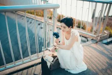 Portable Fans (Photo: <a href="https://www.pexels.com/photo/woman-in-white-dress-using-portable-fan-outdoors-29854260/" target="_blank" rel="noreferrer noopener nofollow">Jason Hu</a> / Pexels)