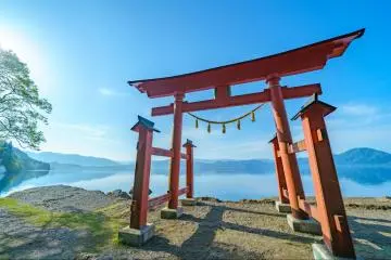 Gozanoishi Shrine’s torii gate on the shore of Lake Tazawa, Akita Prefecture