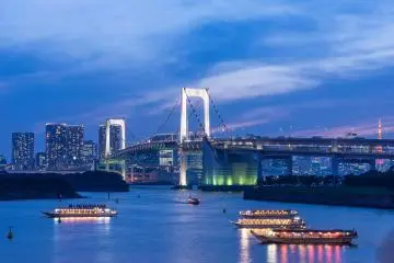 Yakatabune boats by Rainbow Bridge